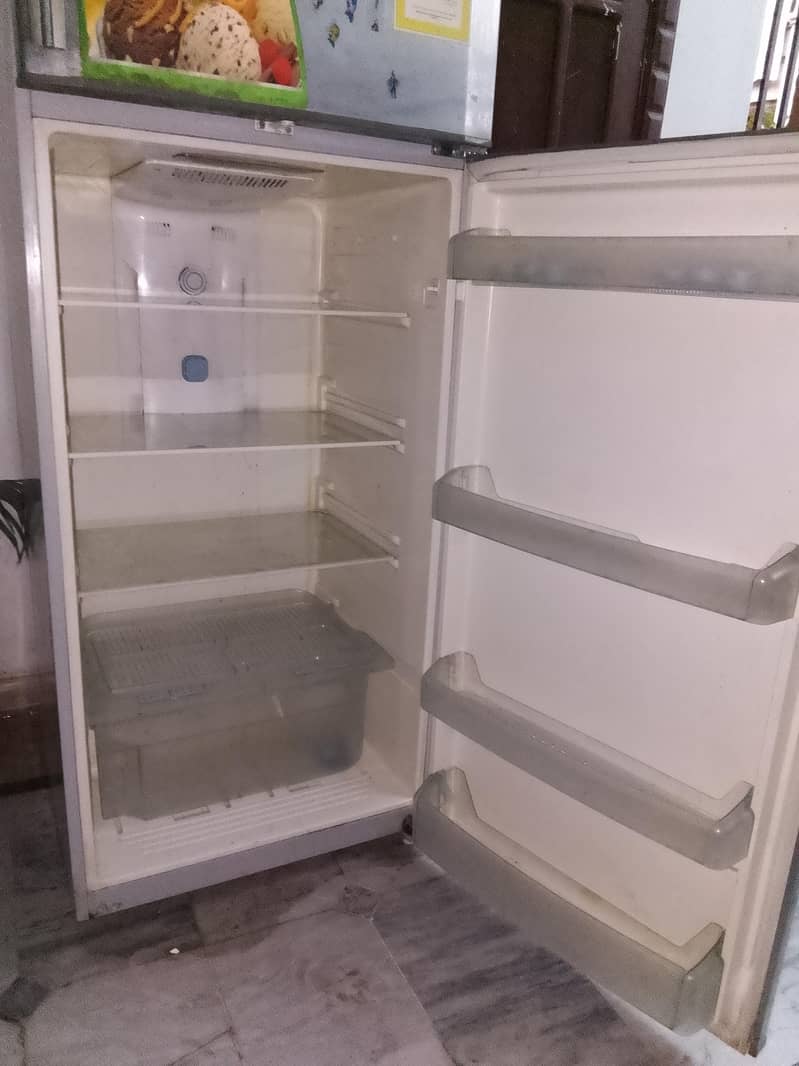 dansite fridge full size at 47000 only it have a minor Cooling issue. 1