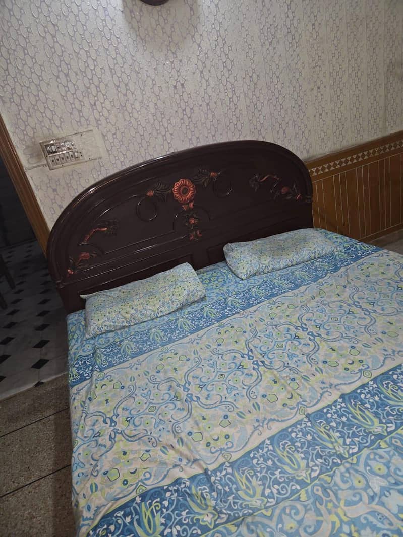 king size bed with 2 side tables and dressing table 3