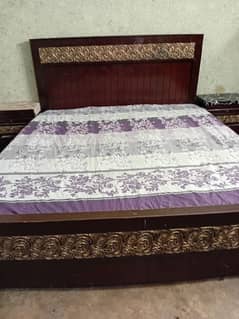 wooden bed set. . queen bed with side table and dressing