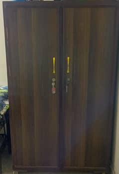 two door wooden cupboard in good condition