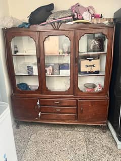 Old fashioned dressing and crockery showcase for sale.