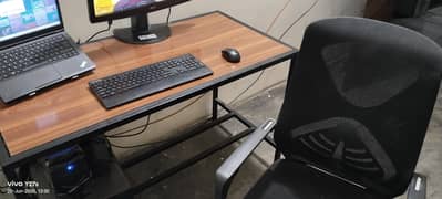 A lasani+metal table with an imported comfortable chair