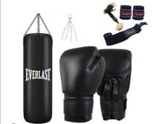 Boxing bag (filled) with accesories for sale