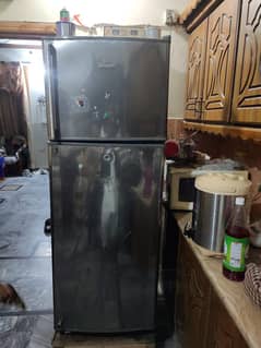 I sel my Dawlance fridge medium size home use urgent sale