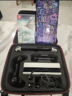Nintendo Switch OLED mint condition 2022 with games and accessories