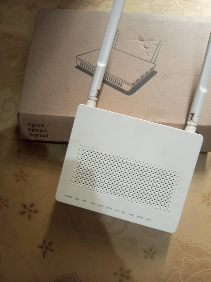 High-Speed WiFi Router | Dual Antenna | Optical Network Terminal (ONT) 1
