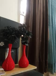 pair of plastic vase with beautiful roses