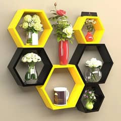 Wall shelves give a stylish look to your living room