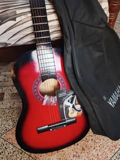 Basic guitar for beginners, with bag ,capo and extra string.