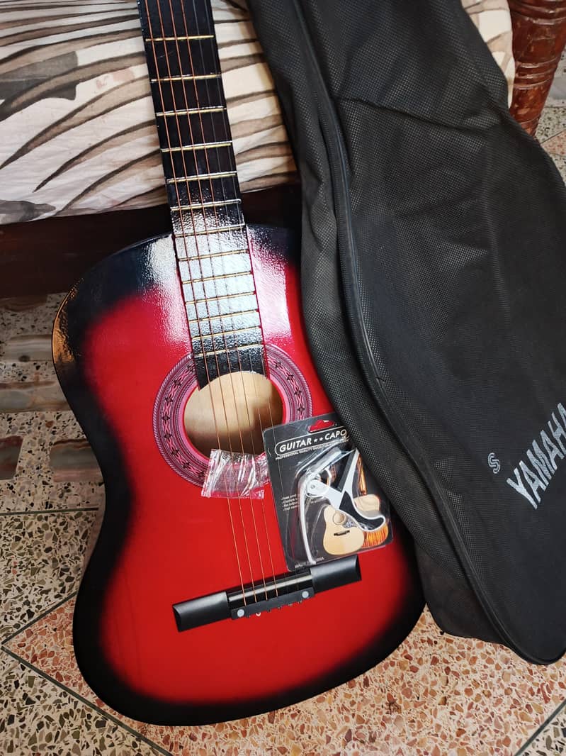 Basic guitar for beginners, with bag ,capo and extra string. 0