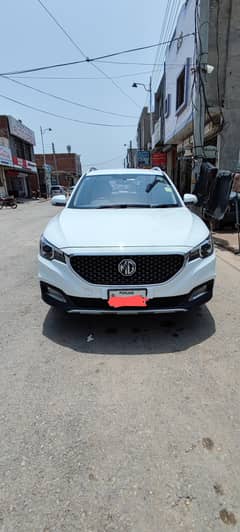 MG