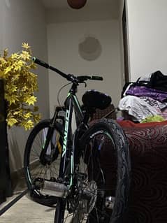 3 cycles and two electric bikes