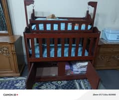 baby cot and swing