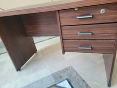 office table and revolving chairs