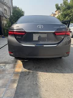 Toyota Altis grande 1.8 grey colour only 2 left fender touch