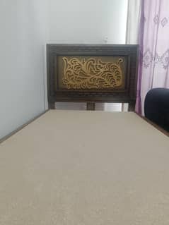 pair of single wooden bed  without mattress