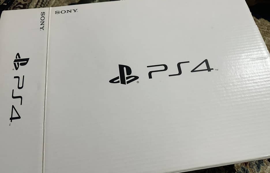 PS4 with 2 controllers with box and cables 2
