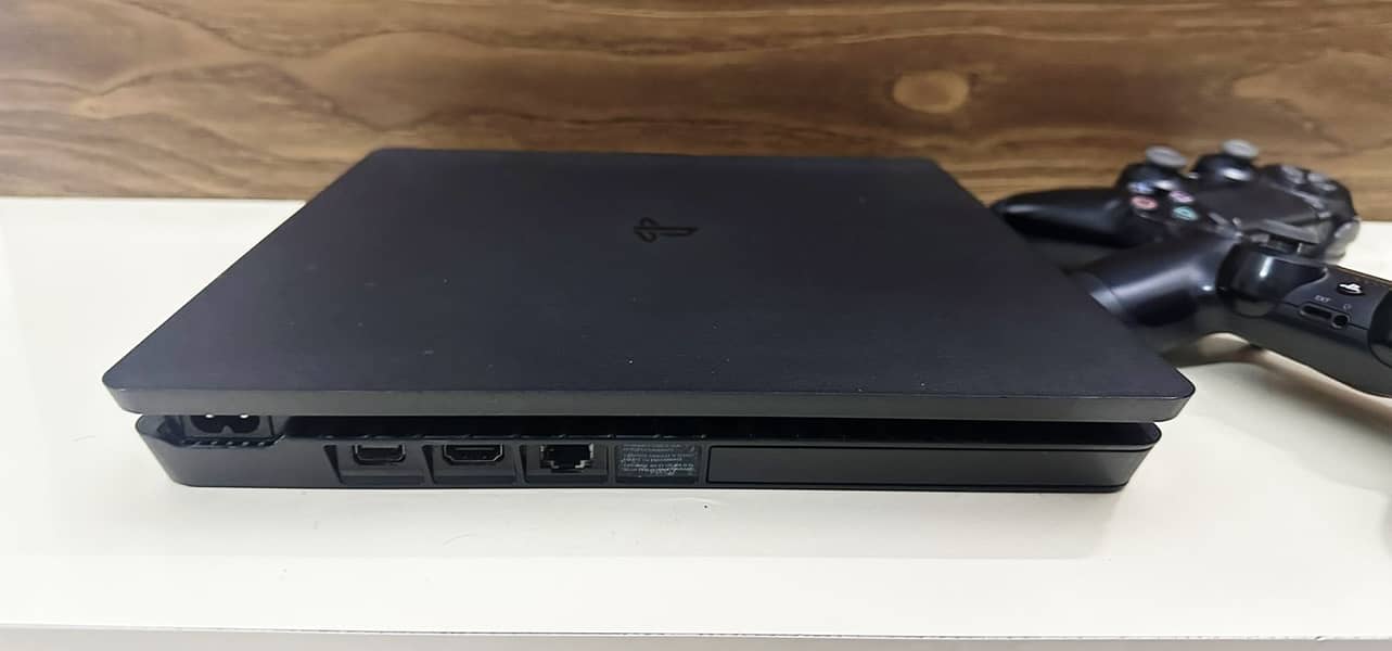 PS4 with 2 controllers with box and cables 4