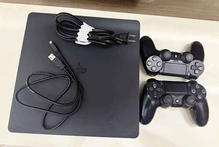 PS4 with 2 controllers with box and cables 5