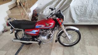 Honda 125 Red Colour Double Tanky set In very Good Condition.