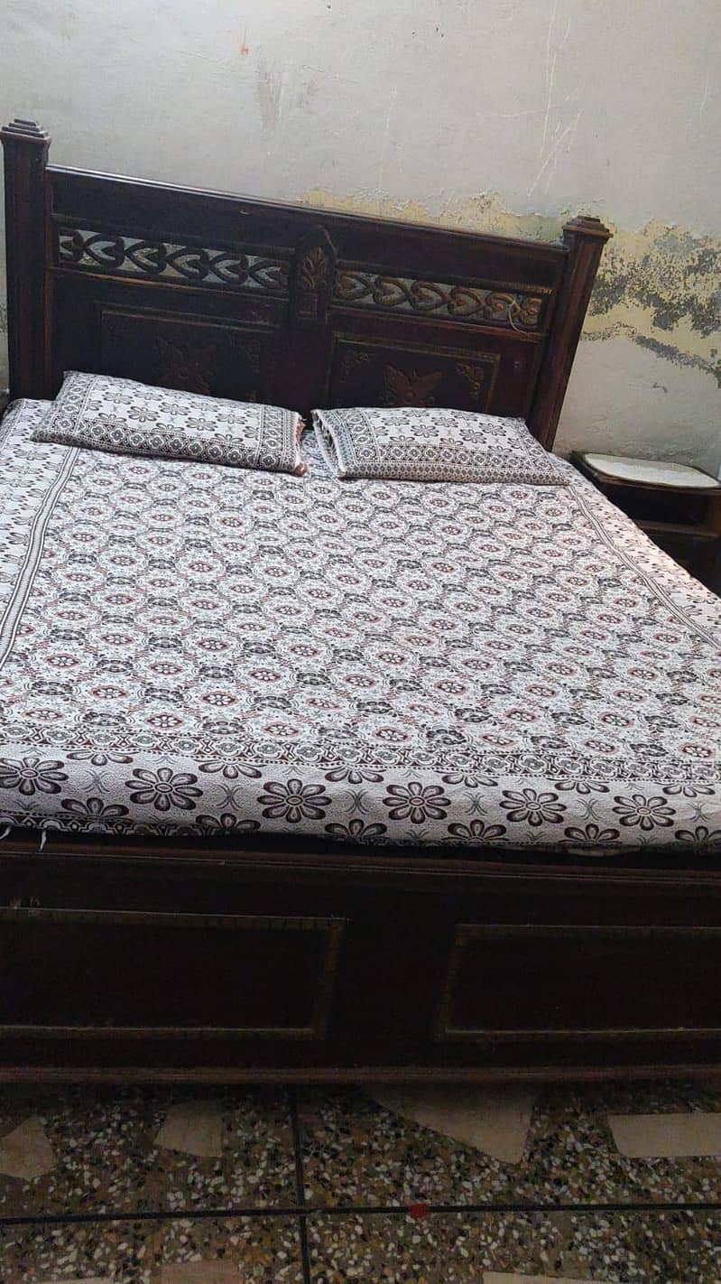 double bed with side tables and spring mattress and dressing table 0