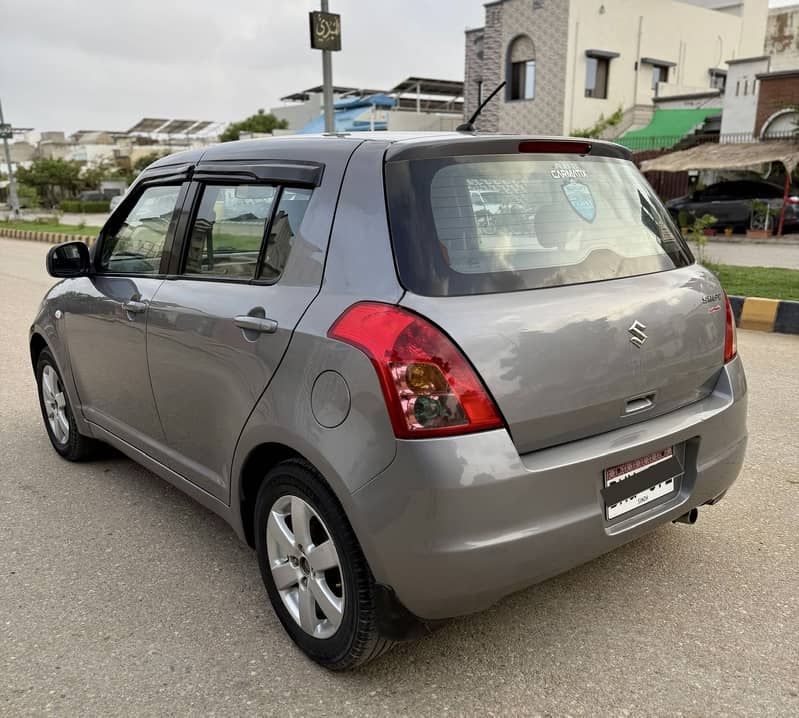 SUZUKI SWIFT TOP OF THE LINE AUTO DLX NAVIGATION EMINENT CONDITION 2