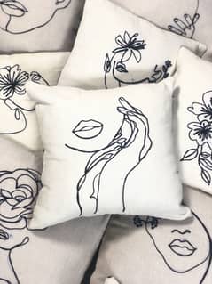 Embroidered Line Art Cushion Covers – Handmade & Elegant”