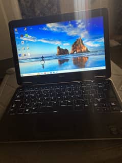 Dell laptop E7040 model 4/128