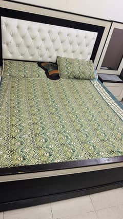 king size bed and dressing table