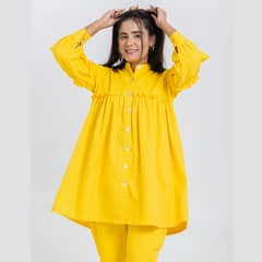 yellow loose fit peplum top and trouser
