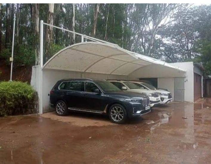 car parking shed. / fiber shed / parking shed / tan sail sheet shed 1
