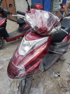 united 100cc scooty contact 0300 4142432