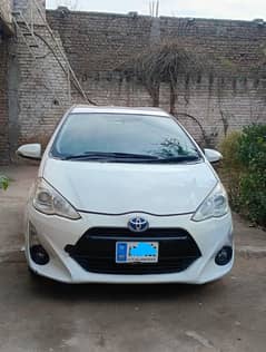 Toyota Aqua Pearl White S Shape 2015 model