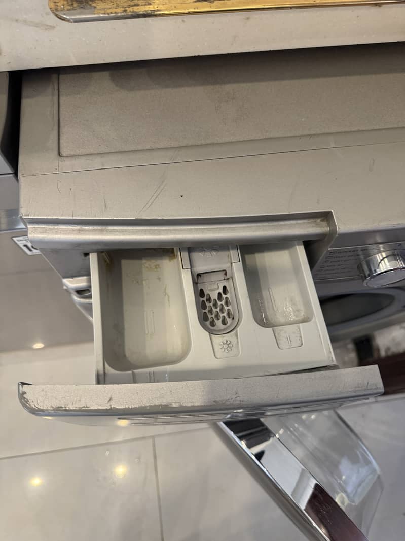 Sharp front load automatic washing machine 1