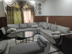 L Shaped sofa with cushions