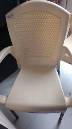 3 plastic beige colour chairs