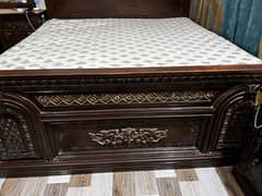 Queen bed with two side tables and dressing table in good condition