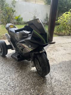Kids charging electrical bike