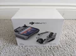 DJI Mini 4 Pro with charging dock and 2 batteries
