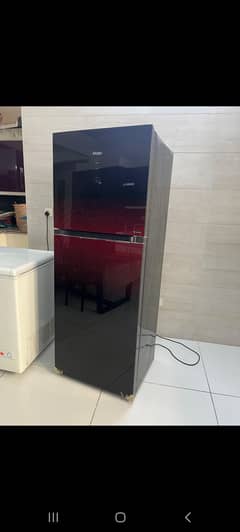 13 cubic feet minimal used new condition haier refrigerator