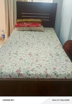 single wooden bed