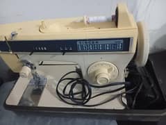 sewing machine + designing machine + motor + light + box
