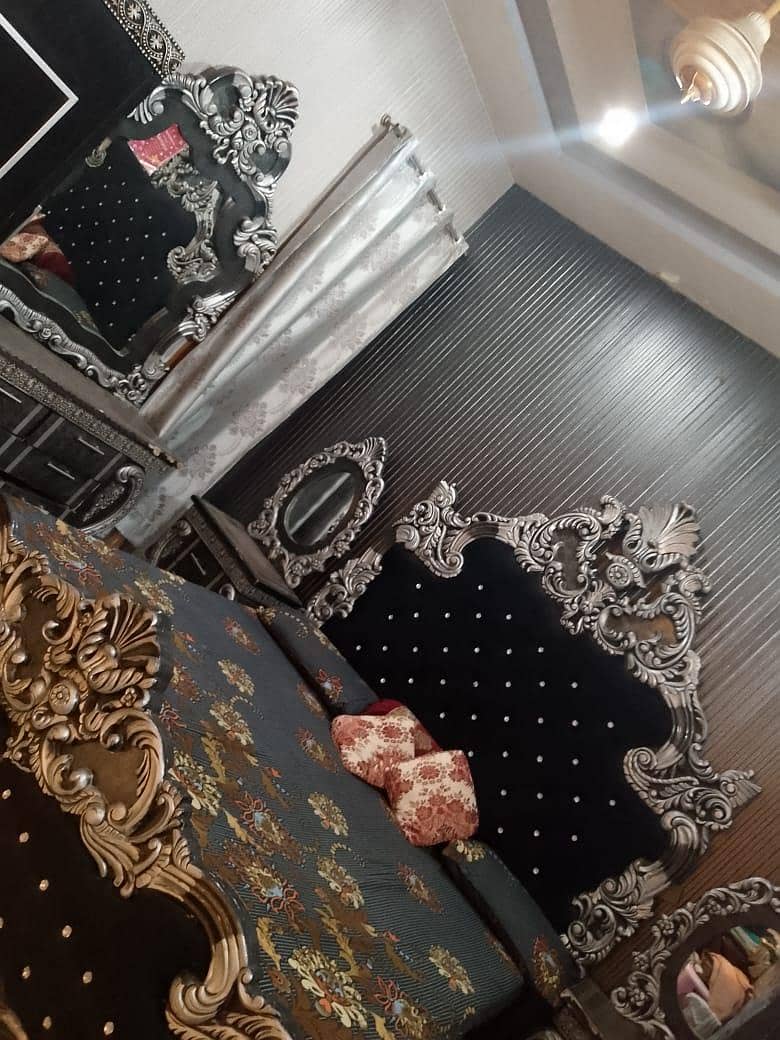 1 year used bed set with side tables  and dressing tale 1