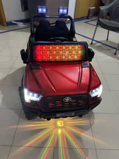 REMOTE OPERATED KID RIDE ON CAR