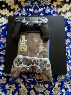 Playstation 4 with 2 controllers and games