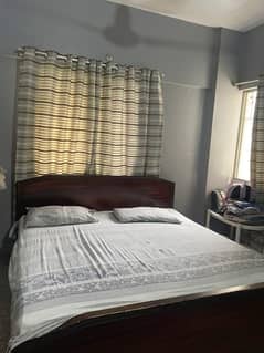 2 wooden beds and 1 wooden cupboard