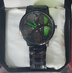 wheel design watch with total matel frame