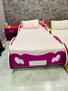 A Unicorn bed with Mattress and Side Table