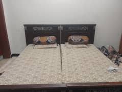 two single bed with one mattress