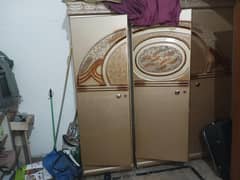 Golden color triple safe Almirah